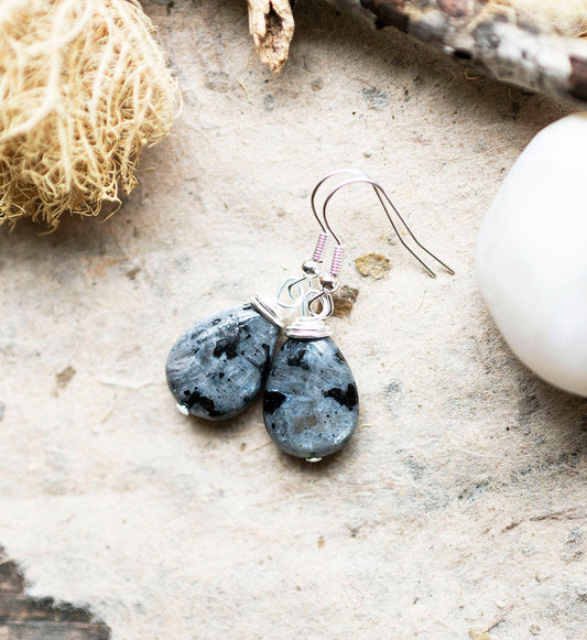 larvikite black and grey gemstone with blue flash in the light